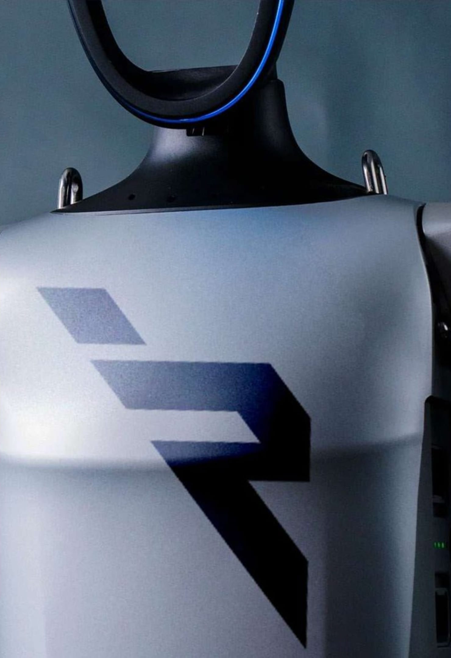 Close-up of a robot's chest bearing the Emirates Robotics Club R mark